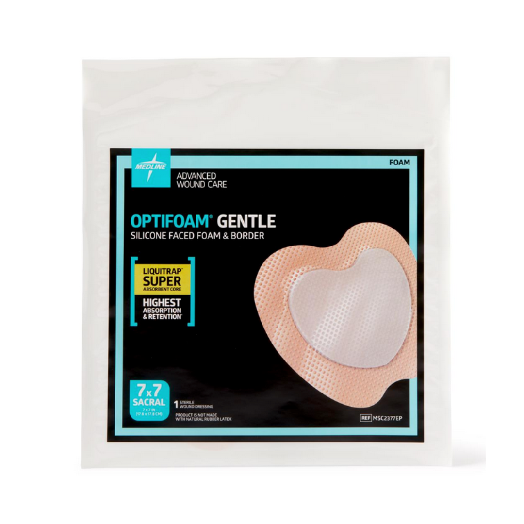 A white package of Medline Optifoam Gentle LQ Silicone-Faced Foam Wound Dressing, 7 x 7 sacral size, shows a heart-shaped dressing through the packaging. The label notes highest fluid retention.
